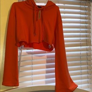 Bell Sleeved Orange Cropped Hoodie.